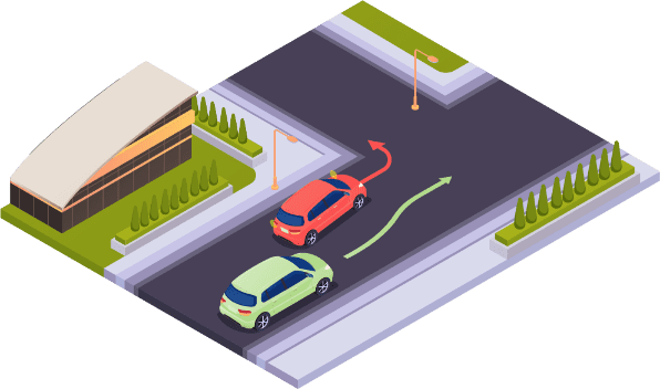 Voiture rouge qui tourne à gauche pendant qu'une voiture verte la dépasse par la droite